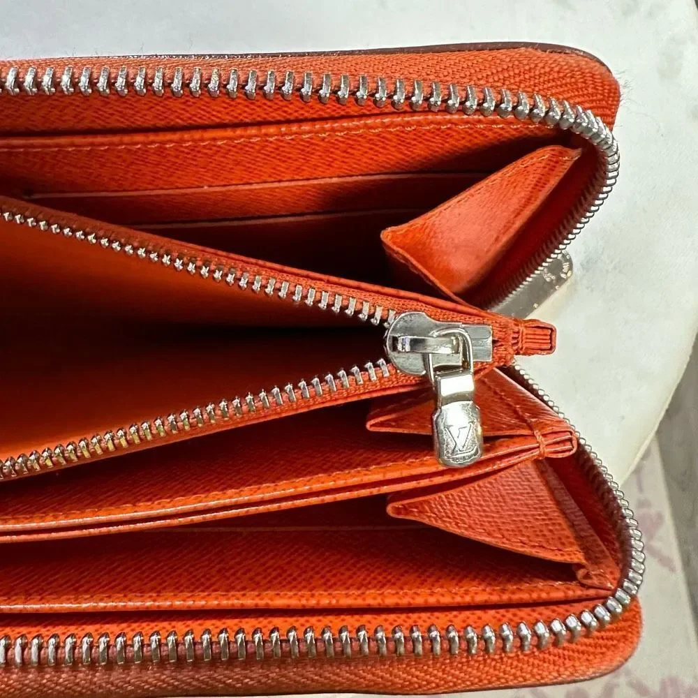 LOUIS VUITTON Long Wallet Epi Zippy Orange Women's Men's Leather
